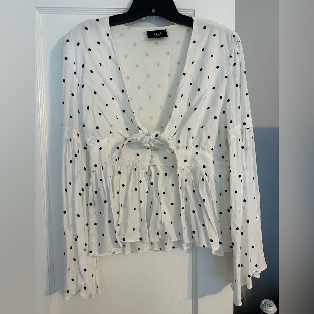 Beautiful flirty Vici top